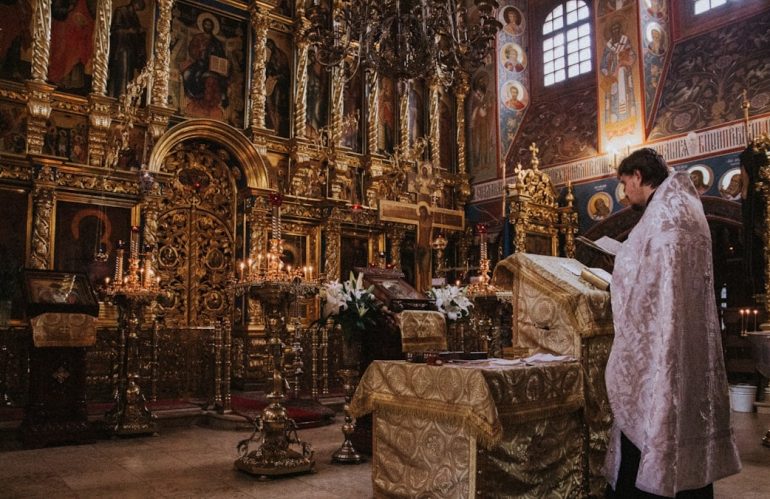 Priest in church
